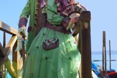 couple in carnival costume on background gondolas